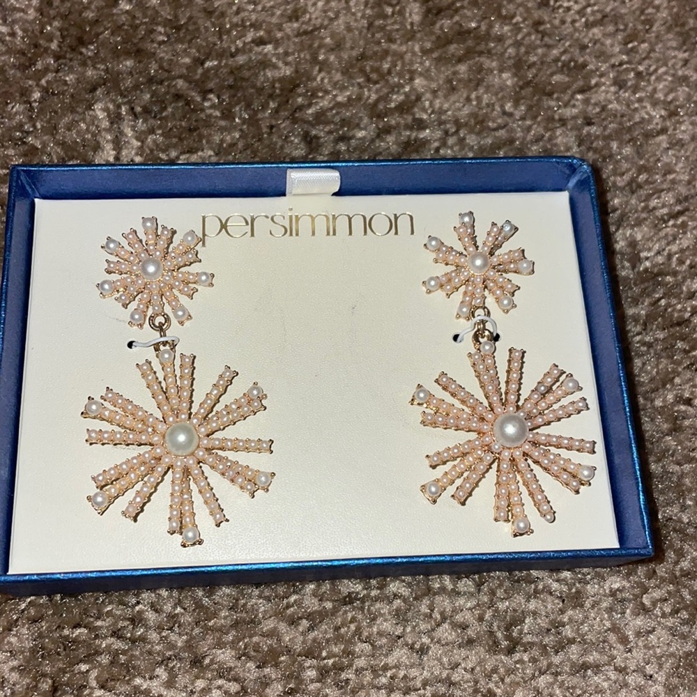 Long pearl and gold snowflake earrings